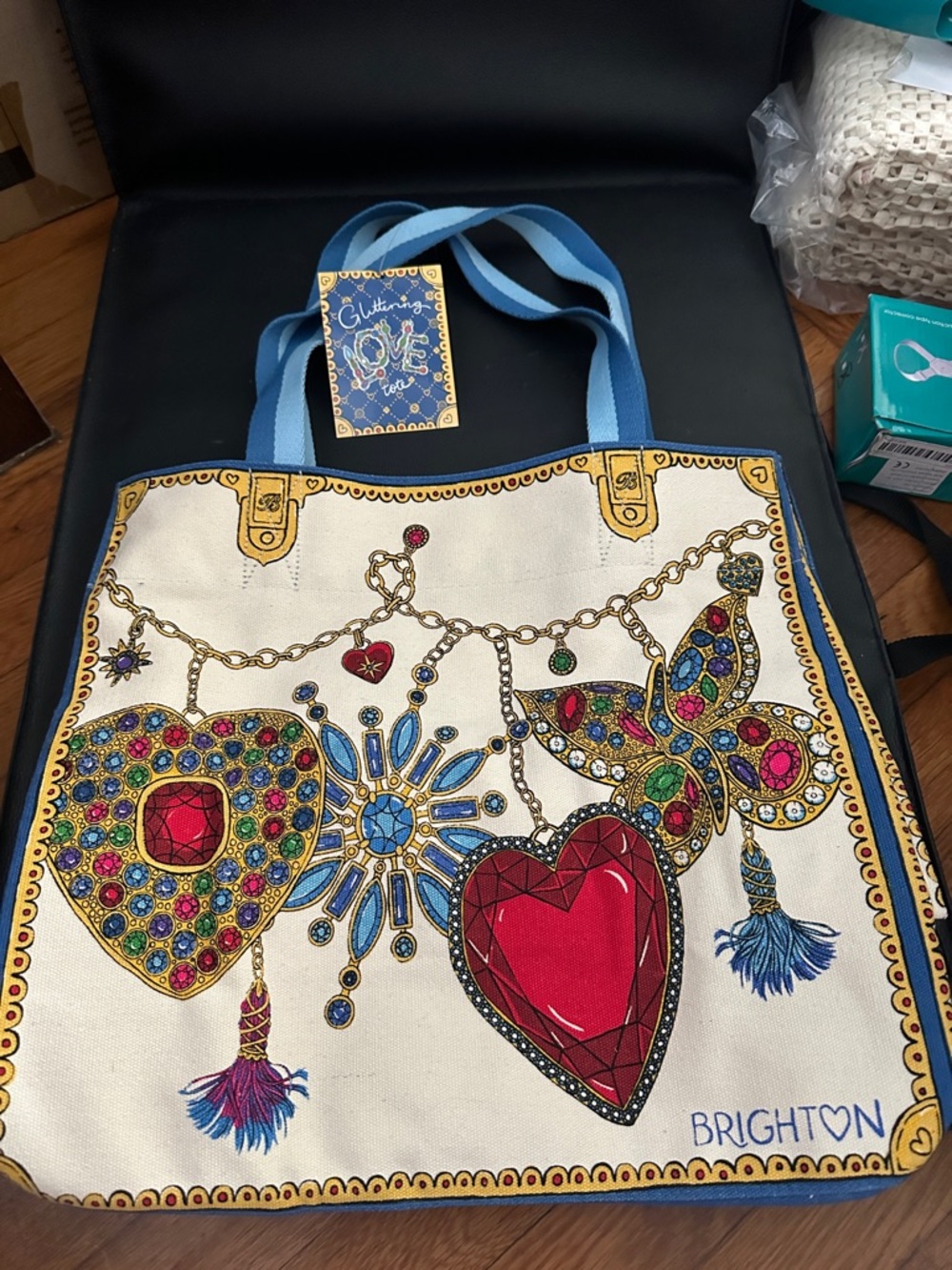 Brighton Cream Tote with Blue Handles and Multicolor Jeweled Heart Motifs